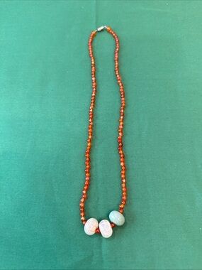 Orange Beaded Necklace with Pale Green and White Stone Accents